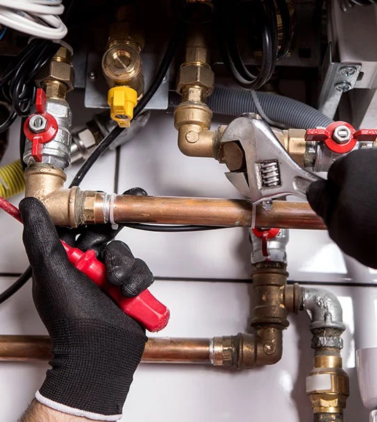 point of view of a plumber fixing pipes